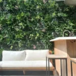 poolside faux green wall installation